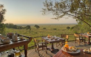 Bateleur Camp deck Masai Mara with Albatros East Africa courtesy &Beyond