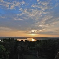Maya-trails-guatemala-Yaxha-temple-sunset-lagoon